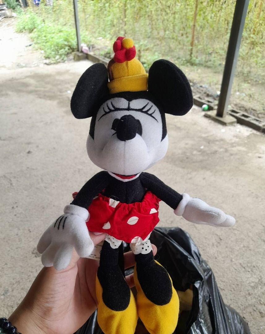 Minnie Mouse – Disneyland Paris Plush (Category: Plushies & Soft Toys) located in Paombong. Submitted by revox.store (Listing ID 1459834961, Image 1). Description: Disneyland Paris • Disney • Plush Included: ✓ Minnie Mouse plush with yellow hat, polka dot skirt, and bloomers "Limited Edition" printed on skirt tag Flaws: • Light surface lint on plush face and ears • Minor wrinkling on skirt fabric 🏬 Stored at partner warehouse (Nueva Ecija) — sen