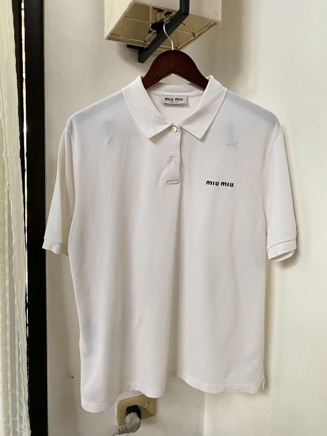 Miu Miu Polo Shirt (Category: Others Tops) located in Quezon City. Submitted by maeee_99 (Listing ID 1459796971, Image 2). Description: Miu Miu Polo - Authentic - Color: White - Embroidered Logo - Dimension: 21 x 25 - Color Rate: 9/10 DM🩷📩.