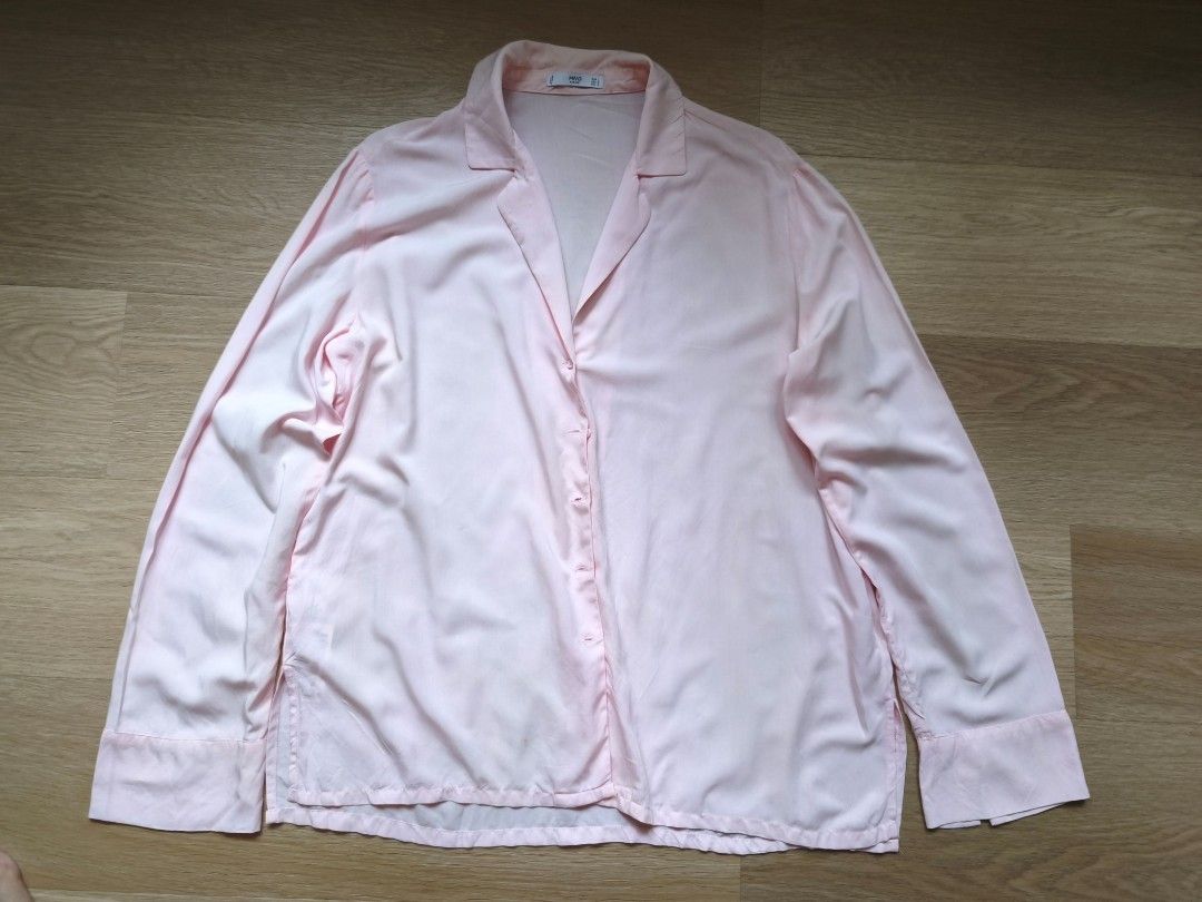 MNG Basics (Mango) Light Pink Long-Sleeve Button-Down Blouse (Medium - Large) (Category: Blouses) located in Bustos. Submitted by astraea_cloei (Listing ID 1459758502, Image 1). Description: Condition: Preloved / Good Condition Description: Classic and lightweight MNG Basics (Mango) long-sleeve button-down blouse in a soft, delicate light pink shade. Made from lightweight, breathable fabric with a relaxed collar, perfect for office wear, smart ca