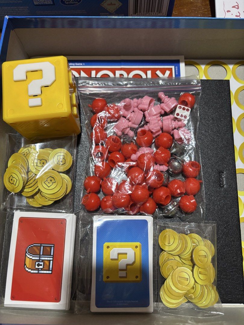 Monopoly Super Mario Celebration Edition Board Game (Category: Board Games & Puzzles) located in Manila. Submitted by wardrobeinmnl (Listing ID 1459847793, Image 3). Description: INCOMPLETE (Missing: 2 title deeds, 1 peach castle, 1 5coin) - Monopoly Super Mario Celebration Edition - Includes all game pieces, cards, coins, and dice - Box has minor wear on the corner - Fun for all ages!.