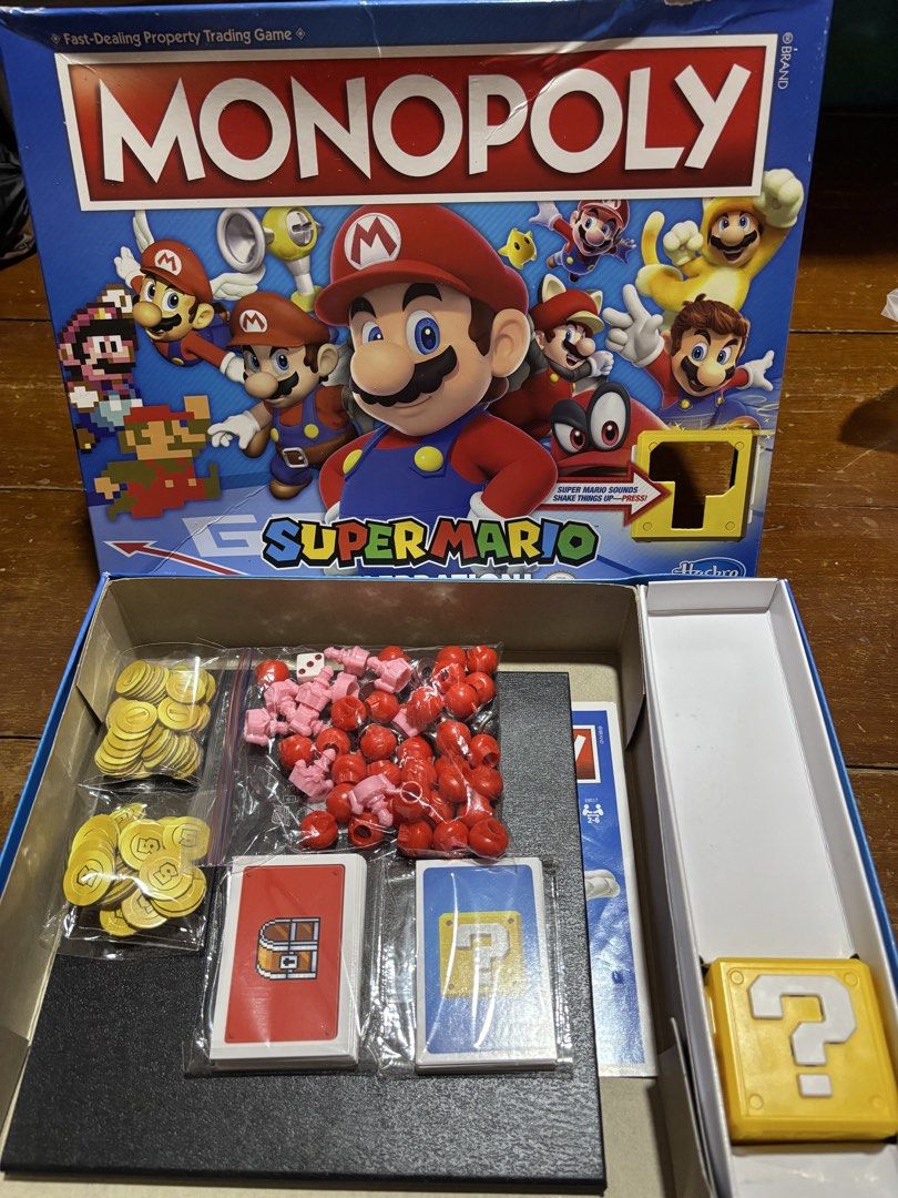 Monopoly Super Mario Celebration Edition Board Game (Category: Board Games & Puzzles) located in Manila. Submitted by wardrobeinmnl (Listing ID 1459847793, Image 1). Description: INCOMPLETE (Missing: 2 title deeds, 1 peach castle, 1 5coin) - Monopoly Super Mario Celebration Edition - Includes all game pieces, cards, coins, and dice - Box has minor wear on the corner - Fun for all ages!.