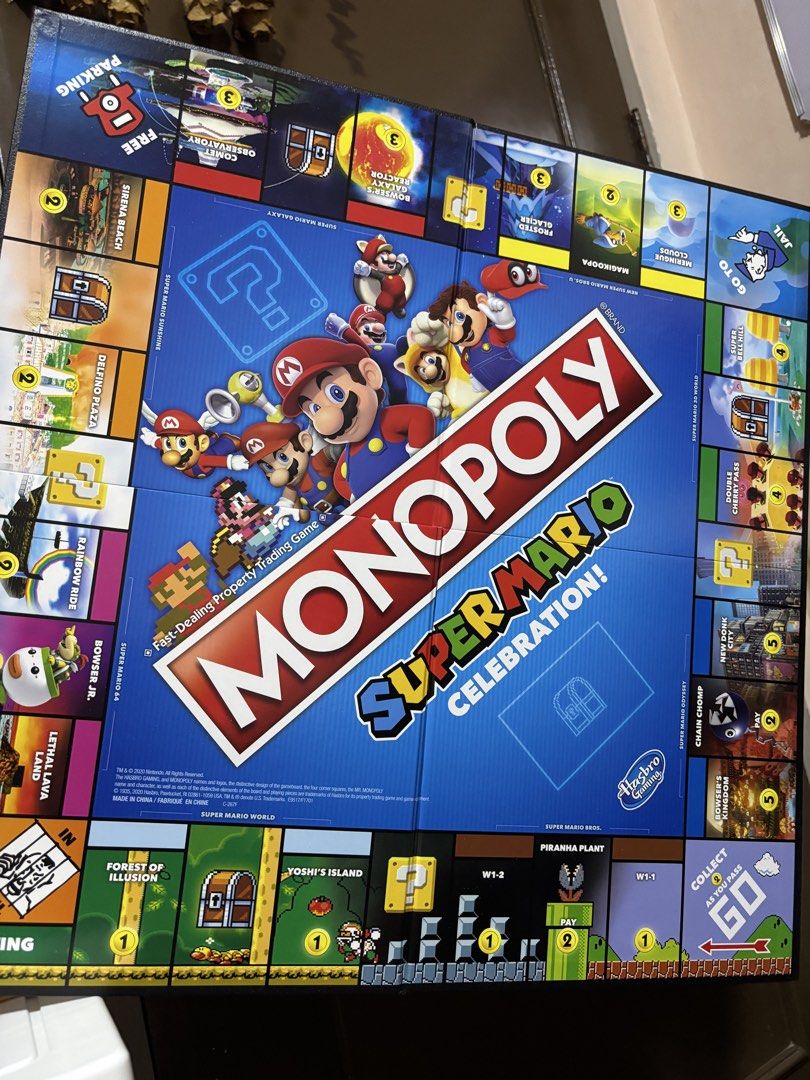Monopoly Super Mario Celebration Edition Board Game (Category: Board Games & Puzzles) located in Manila. Submitted by wardrobeinmnl (Listing ID 1459847793, Image 2). Description: INCOMPLETE (Missing: 2 title deeds, 1 peach castle, 1 5coin) - Monopoly Super Mario Celebration Edition - Includes all game pieces, cards, coins, and dice - Box has minor wear on the corner - Fun for all ages!.
