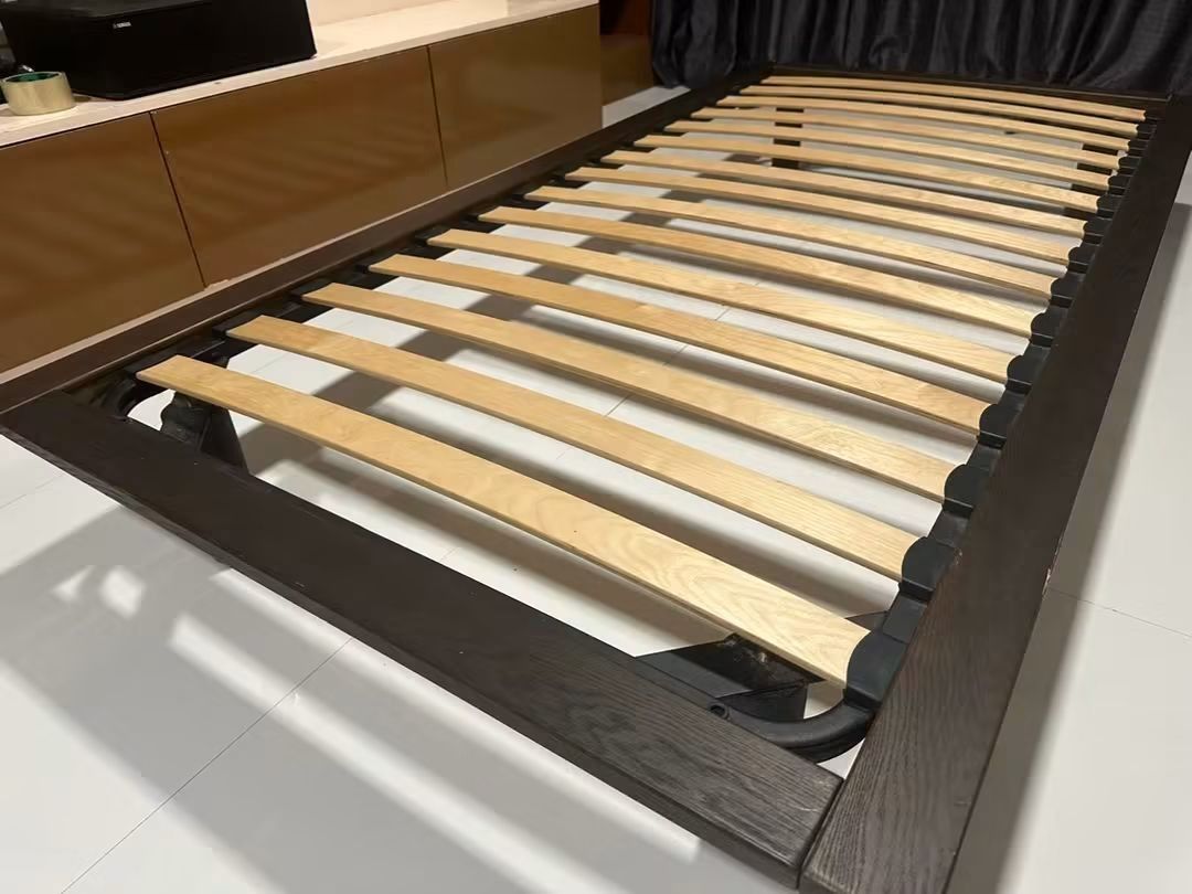 Muji floating bed (Category: Bed Frames & Mattresses) located in Makati City. Submitted by candyhinojales (Listing ID 1459807429, Image 3). Description: - Dark brown single bed frame - Sturdy wooden slats for mattress support - Simple, modern design - Ideal for small rooms or guest beds - Easy to assemble - Mattress not included.