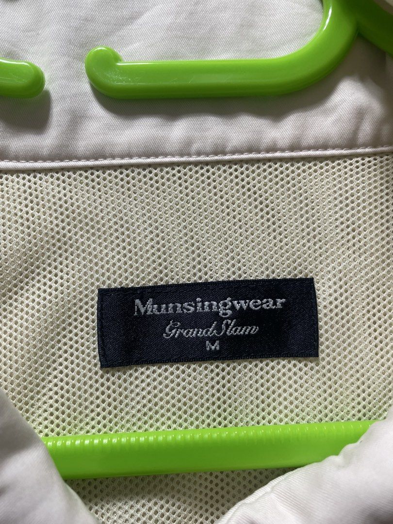 Munsingwear Grand Slam Jacket Size M (Category: Coats, Jackets and Outerwear) located in Itogon. Submitted by boyetfinds (Listing ID 1459829744, Image 3). Description: - Lightweight Munsingwear jacket - Classic zip-up front - Buttoned pockets - Munsingwear penguin logo on chest - Ideal for casual wear or layering - Size: Medium.