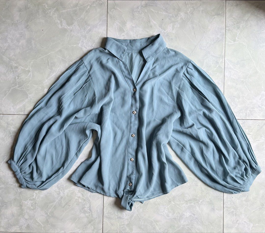 Muted Teal Long Sleeve Button Up Blouse with Tie Front (Category: Blouses) located in General Santos City (Dadiangas). Submitted by ssssshhhhhhhhh (Listing ID 1459733788, Image 1). Description: New Donna Muted Teal Long Sleeve Blouse. Collared, button-up front. Voluminous sleeves, tie-front hem. Lightweight, flowy fabric. Size S..