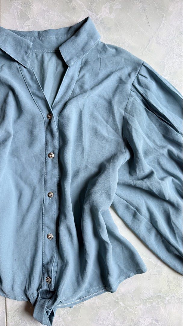Muted Teal Long Sleeve Button Up Blouse with Tie Front (Category: Blouses) located in General Santos City (Dadiangas). Submitted by ssssshhhhhhhhh (Listing ID 1459733788, Image 2). Description: New Donna Muted Teal Long Sleeve Blouse. Collared, button-up front. Voluminous sleeves, tie-front hem. Lightweight, flowy fabric. Size S..
