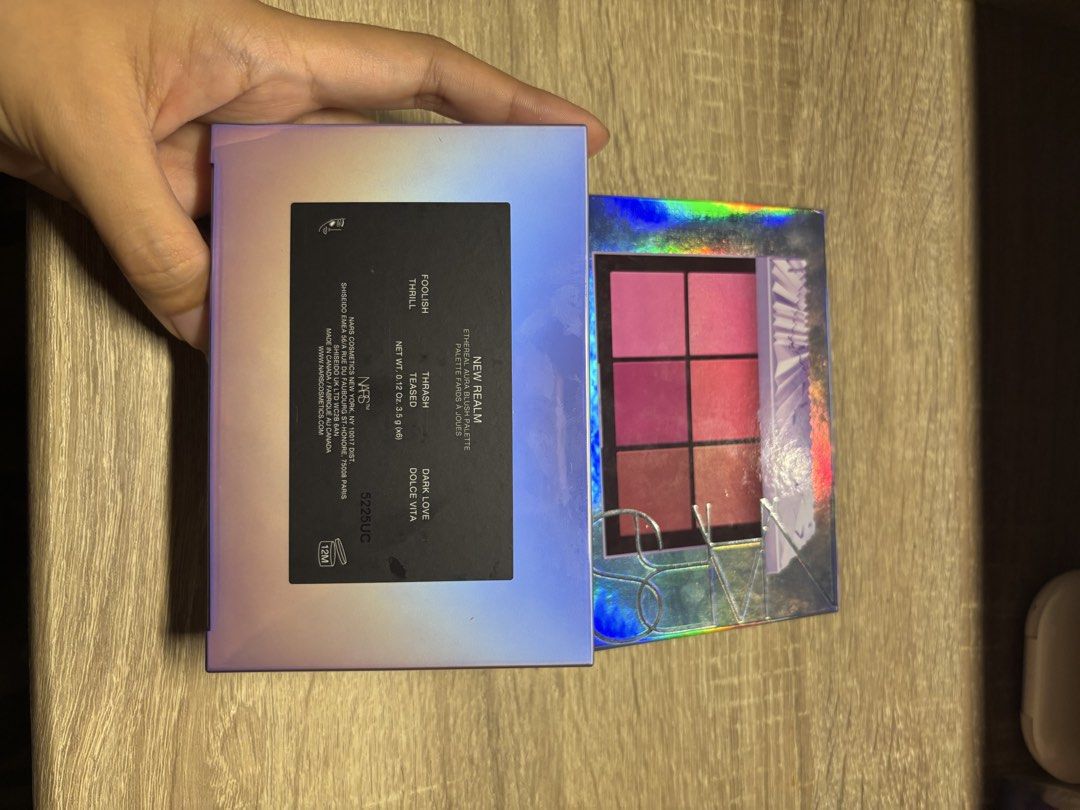 NARS New Realm 6 Pan Blush Palette (Category: Makeup) located in Davao. Submitted by mielle_888 (Listing ID 1459863303, Image 2). Description: ‼️Authentic & from US Sephora‼️ Swatched only and never been used for face ✨Limited edition NARS New Realm Blush Palette✨ - Includes 6 versatile blush shades - Features popular shades: Thrill, Teased, Dolce Vita, and Baby Girl - Eye-catching holographic packaging - Ideal for creating diverse makeup looks -