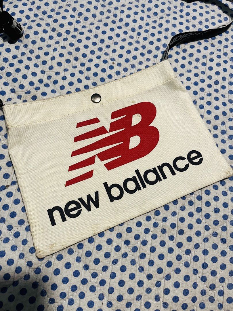 New Balance Sling Bag (Category: Sling Bags) located in Navotas City. Submitted by y2kikaystuff (Listing ID 1459858034, Image 2). Description: New Balance Sling Bag With Mini Compartment Not ukay Personal item from Japan No issue Need wash Madumi lang From 600 down to 400 only Pm me.