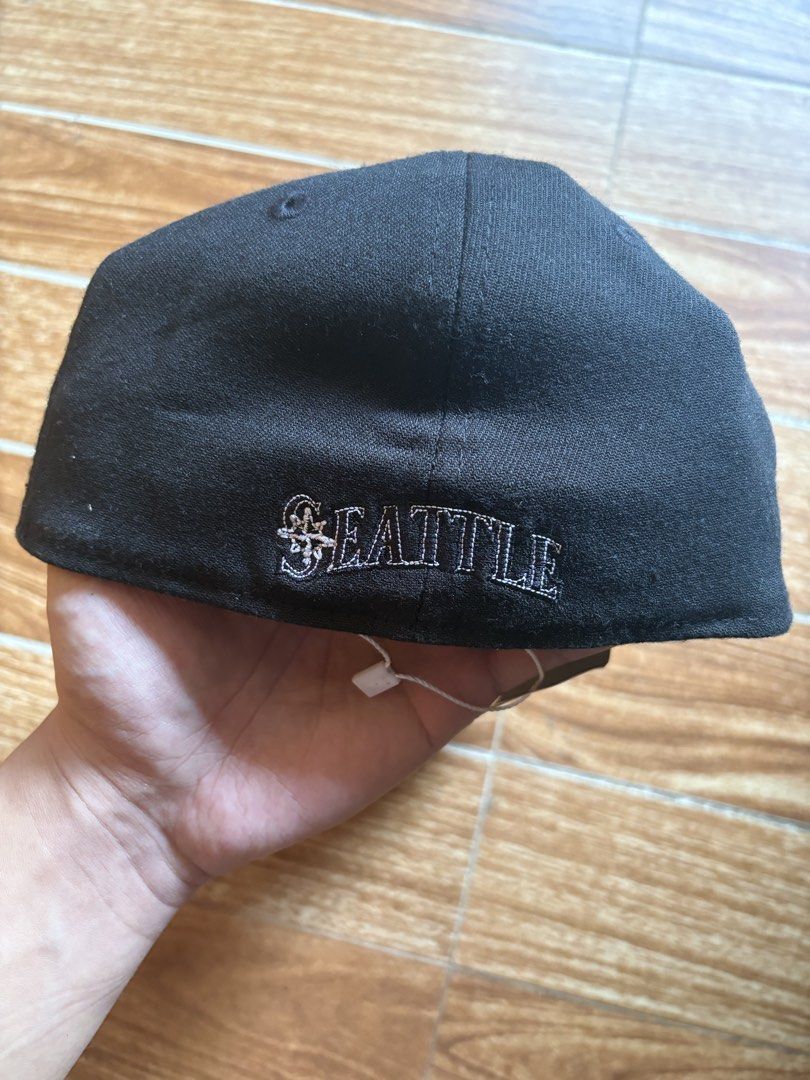 New Era Seattle Mariners Baseball Cap (Category: Caps & Hats) located in Manila. Submitted by selectors_club26 (Listing ID 1459729990, Image 3). Description: - Authentic Seattle Mariners cap - Features iconic team logo on the front - 'Seattle' embroidered on the back - New Era branding on the side - Size: Small-Medium (S-M) - Ideal for any Mariners fan - Color rate: 9/10.
