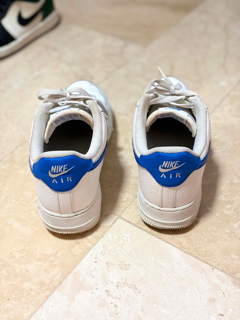 Nike Air Force 1 Low Blue Swoosh (Category: Sneakers) located in Quezon City. Submitted by jayesantos (Listing ID 1459794991, Image 2). Description: - Nike Air Force 1 Low Sneakers - Model: DM2845-100 - Color: White with Blue Accents and Gold Lace Locks - Size: US 7.5 / 6.5 UK/ EUR 40.5 / 25.5 CM - Condition: Used but still in good condition. Few stains but easy to clean. - RFS: Not being used anymore. .