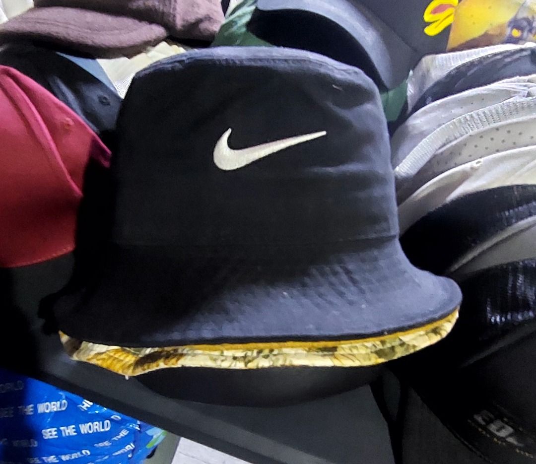 Nike Apex Bucket Hat Black (Category: Caps & Hats) located in Legazpi City. Submitted by street_uniform (Listing ID 1459820004, Image 1). Description: - Black Nike bucket hat - Size: S/P/CH - Unique floral pattern lining inside - Ideal for sunny weather - Packable and versatile for any occasion - Classic Nike accessory.