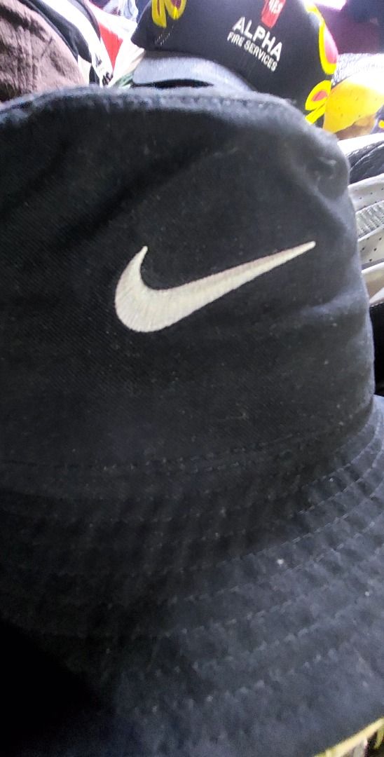 Nike Apex Bucket Hat Black (Category: Caps & Hats) located in Legazpi City. Submitted by street_uniform (Listing ID 1459820004, Image 2). Description: - Black Nike bucket hat - Size: S/P/CH - Unique floral pattern lining inside - Ideal for sunny weather - Packable and versatile for any occasion - Classic Nike accessory.