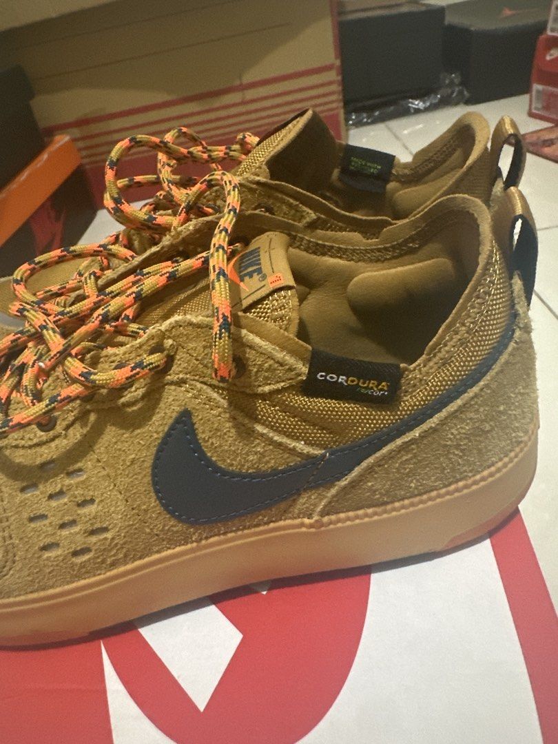 Nike city prm 265 (Category: Sneakers) located in Manila. Submitted by andy0729 (Listing ID 1459693282, Image 3). Description: - Brown Nike sneakers - Durable Cordura fabric on the sides - Unique orange and black speckled laces - Gum sole with vibrant orange accents - Ideal for outdoor adventures and casual style - Comes with the original box.