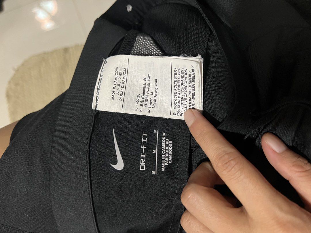 Nike Dri-Fit Running Pants Black Size M (Category: Activewear) located in Lapu Lapu. Submitted by chelon.865 (Listing ID 1459809312, Image 2). Description: - Black Nike Dri-Fit running pants - Made in Cambodia - Size M - Drawstring waist for adjustable fit - Ideal for workouts and running - Reflective details on the side for visibility - Please check photos for condition details.
