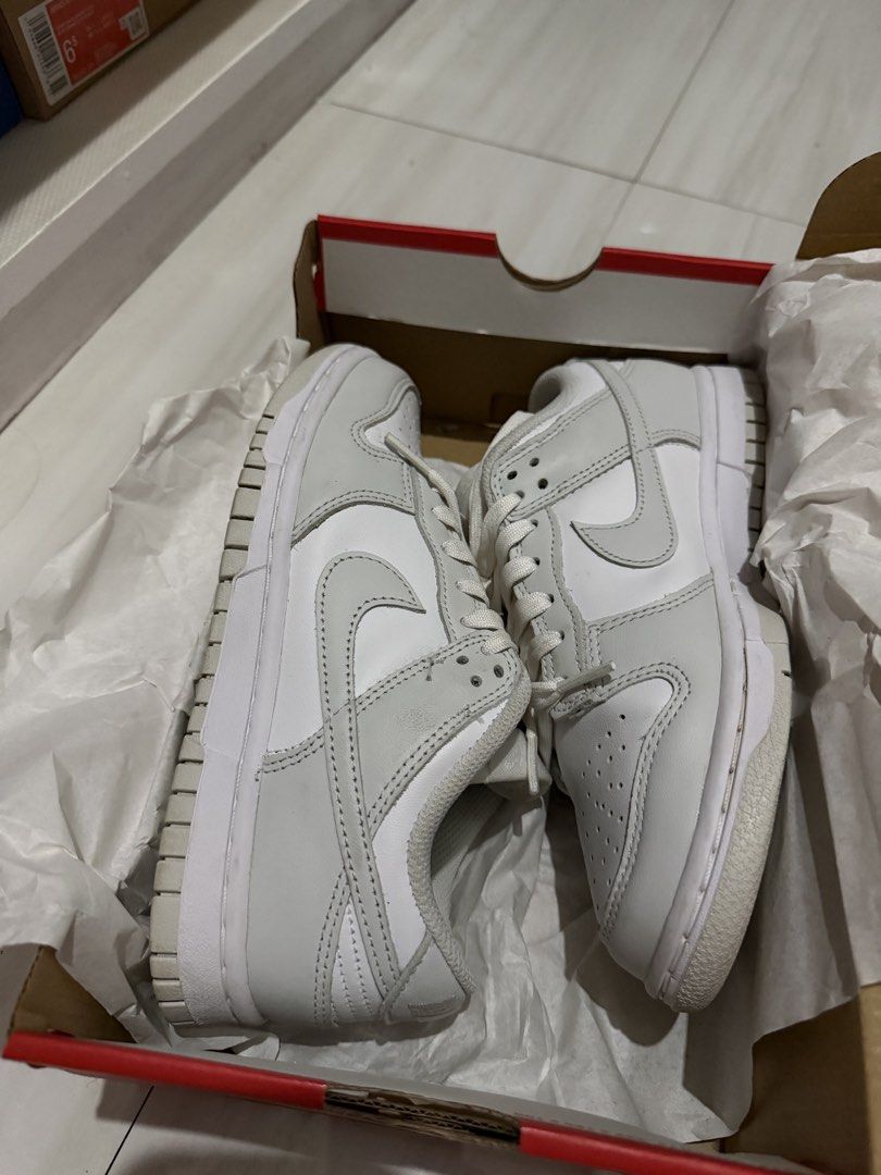 Nike Dunk Low (Category: Sneakers) located in Muntinlupa City. Submitted by downtodeclutter (Listing ID 1459727082, Image 2). Description: Selling my Nike Dunk Low in White/Photon Dust. - Seldom worn - Just needs cleaning - Complete with original box - Size: Women’s US 6 / UK 3.5 / EU 36.5 / 23 cm.