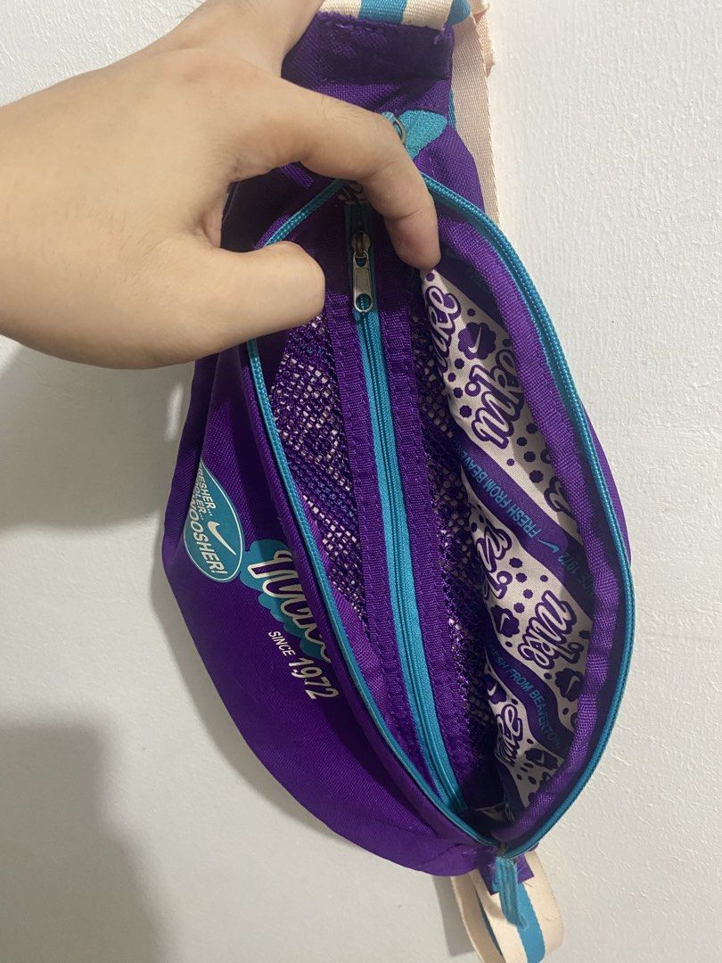Nike Heritage Waistpack Original (Category: Luxury Bags & Wallets) located in Manila. Submitted by zealbird_eacba7 (Listing ID 1459718421, Image 2). Description: Slightly used nike heritage waistpack in purple All zippers are working No isssue .