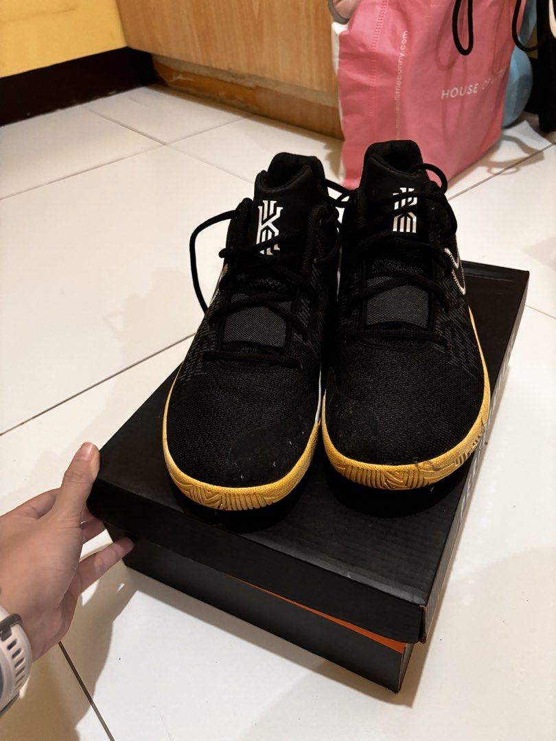 Nike Kyrie Flytrap 4 Black Gum Basketball Shoes (Category: Sneakers) located in Manila. Submitted by rmsm. (Listing ID 1459867282, Image 2). Description: - Nike Kyrie Flytrap 4 basketball shoes - Color: Black with white accents - Sole: Gum sole - Closure: Lace-up with midfoot strap for extra support - Ideal for: Basketball or casual wear - Includes: Original box.