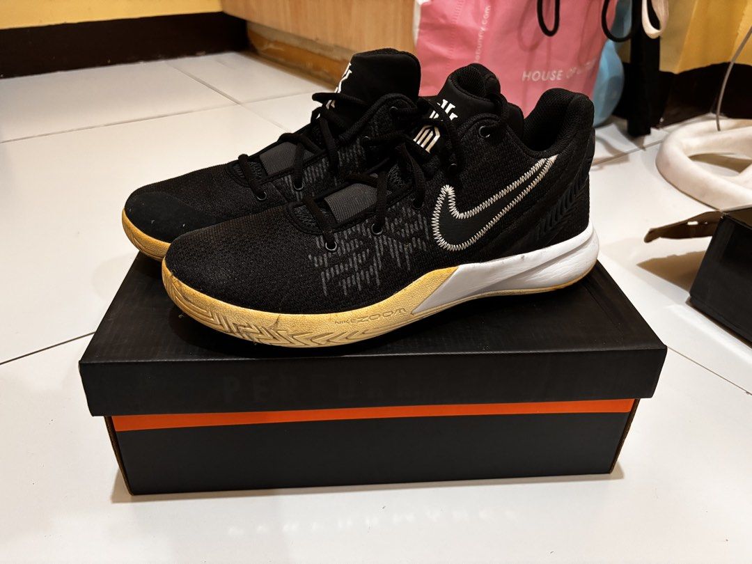 Nike Kyrie Flytrap 4 Black Gum Basketball Shoes (Category: Sneakers) located in Manila. Submitted by rmsm. (Listing ID 1459867282, Image 1). Description: - Nike Kyrie Flytrap 4 basketball shoes - Color: Black with white accents - Sole: Gum sole - Closure: Lace-up with midfoot strap for extra support - Ideal for: Basketball or casual wear - Includes: Original box.