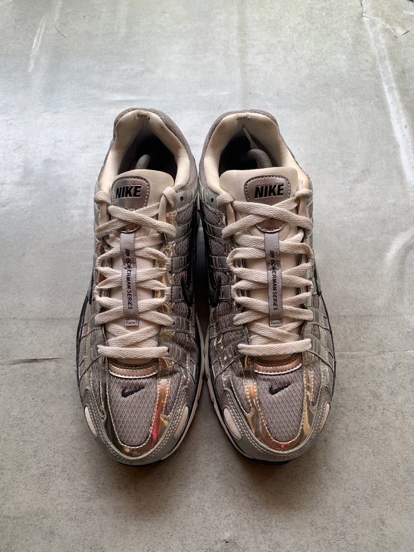 Nike P-6000 "Metallic Silver" Series (Category: Sneakers) located in Cagayan de Oro. Submitted by jename15 (Listing ID 1459725489, Image 2). Description: - Nike P-6000 shoes - Color: Metallic Silver - "NIKE" logo on tongue - Small Nike swoosh on toe box - "EST. 1992" detail on heel - Part of the "P-6000 SERIES".