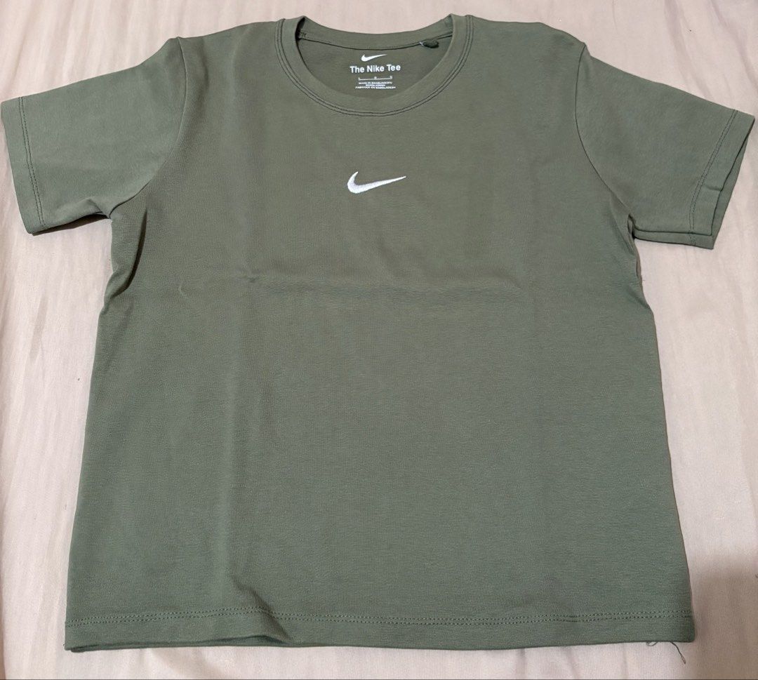 nike shirt (Category: Shirts) located in Batangas. Submitted by cjchelseamm (Listing ID 1459823446, Image 1). Description: L on tag, ladies cut, cotton stretch used once issue: loose threads .