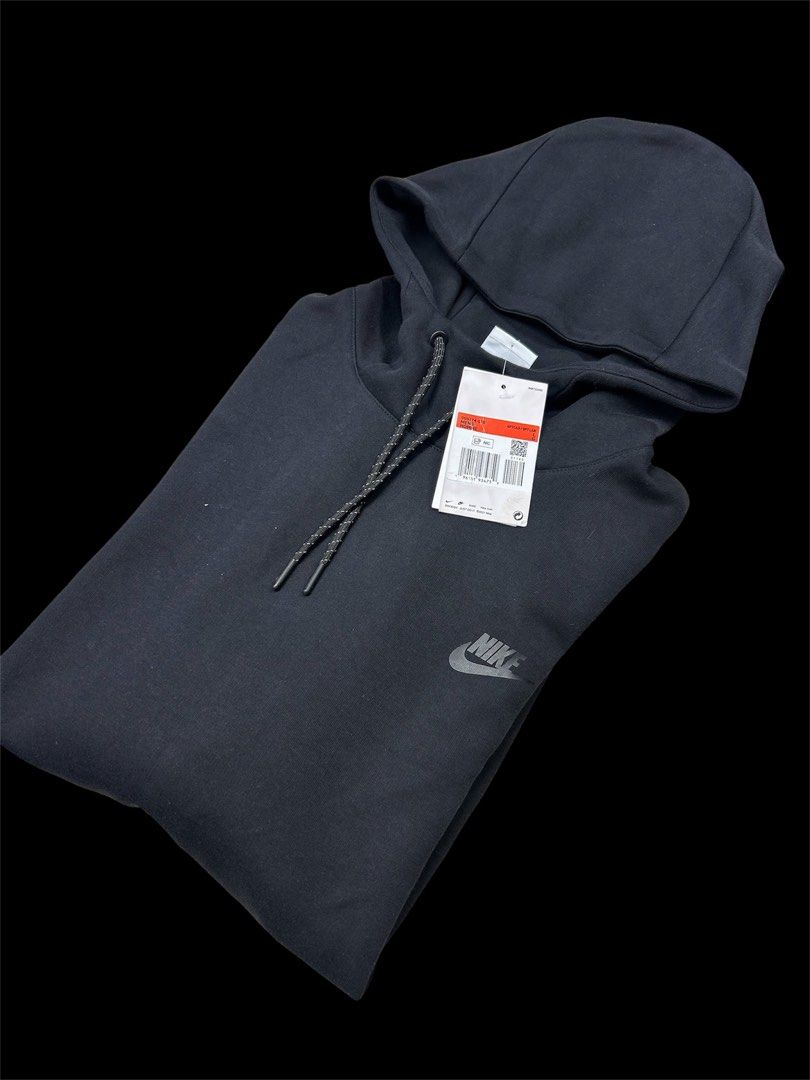 Nike Tech Fleece Hoodie Black (Category: Hoodies) located in Manila. Submitted by bodegabodega (Listing ID 1459773472, Image 2). Description: - Brand: Nike - Style: Tech Fleece Hoodie - Color: Black - Size: Large - Origin: Made in Cambodia - Features: Classic Nike logo on chest and sleeve, drawstring hood, front pocket - Condition: Brand new with tags - Ideal for: Everyday wear, training Nike Tech Fleece Hoodie Large Brandnew tags still intact Ne