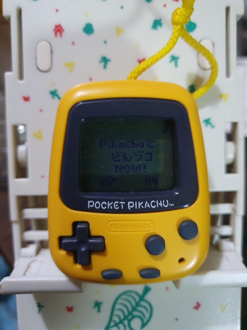 Nintendo Pocket Pikachu Virtual Pet (Category: Interactive Toys) located in Quezon City. Submitted by collectionneursonline88 (Listing ID 1459812207, Image 1). Description: - Yellow Pocket Pikachu virtual pet - Includes yellow lanyard - Screen shows 'Pikachu's Mood: 44' - new Battery - Fun retro collectible 🔄 Meetups Balintawak Camachile 7/11 Quezon City 🛵 Shipping : - Lalamove ( except Provincial) - Flash Express - GogoExpress - LBC 📥 Payment