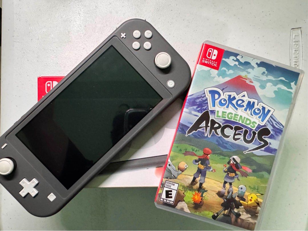 Nintendo Switch Lite Gray with Pokemon Legends Arceus (Category: Nintendo) located in Manila. Submitted by ughndy (Listing ID 1459718128, Image 1). Description: Nintendo Switch Lite – Gray Complete Set with Box & Accessories Inclusions: • Nintendo Switch Lite Console • Original Charger • Safety/User Guide • Free Game: Pokémon Legends: Arceus Purchase Details: Bought in December 2025 from DataBlitz BGC. Condition: 100% working and in very good con