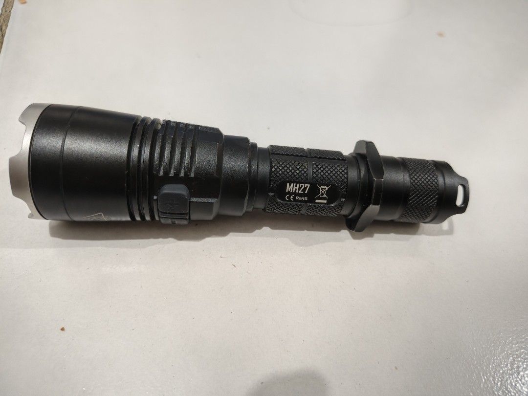 Nitecore MH27 Flashlight (Category: Lighting) located in Pasig City. Submitted by ethan202 (Listing ID 1459812445, Image 1). Description: for sale only unit only and one battery for testing no defects, good condition. reliable brand flashlight. barely used - Nitecore MH27 flashlight - Durable black aluminum body - Features a tactical ring for enhanced grip - Convenient side button for power and mode adjustments - Compact yet powerful design - Per