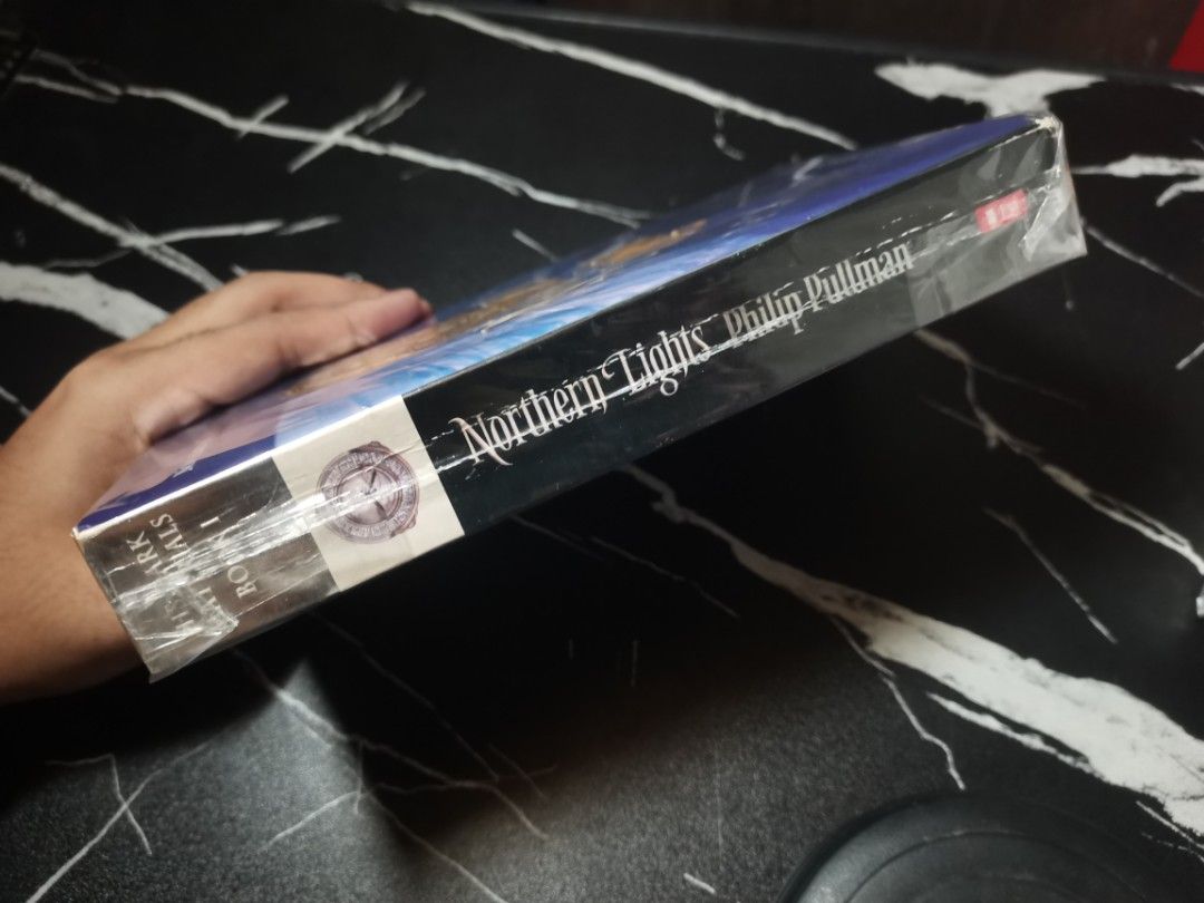 Northern Lights by Philip Pullman His Dark Materials (Category: Storybooks) located in Cavite. Submitted by mibook (Listing ID 1459741557, Image 2). Description: - Light tanning - Spine creases - 69 pesos.