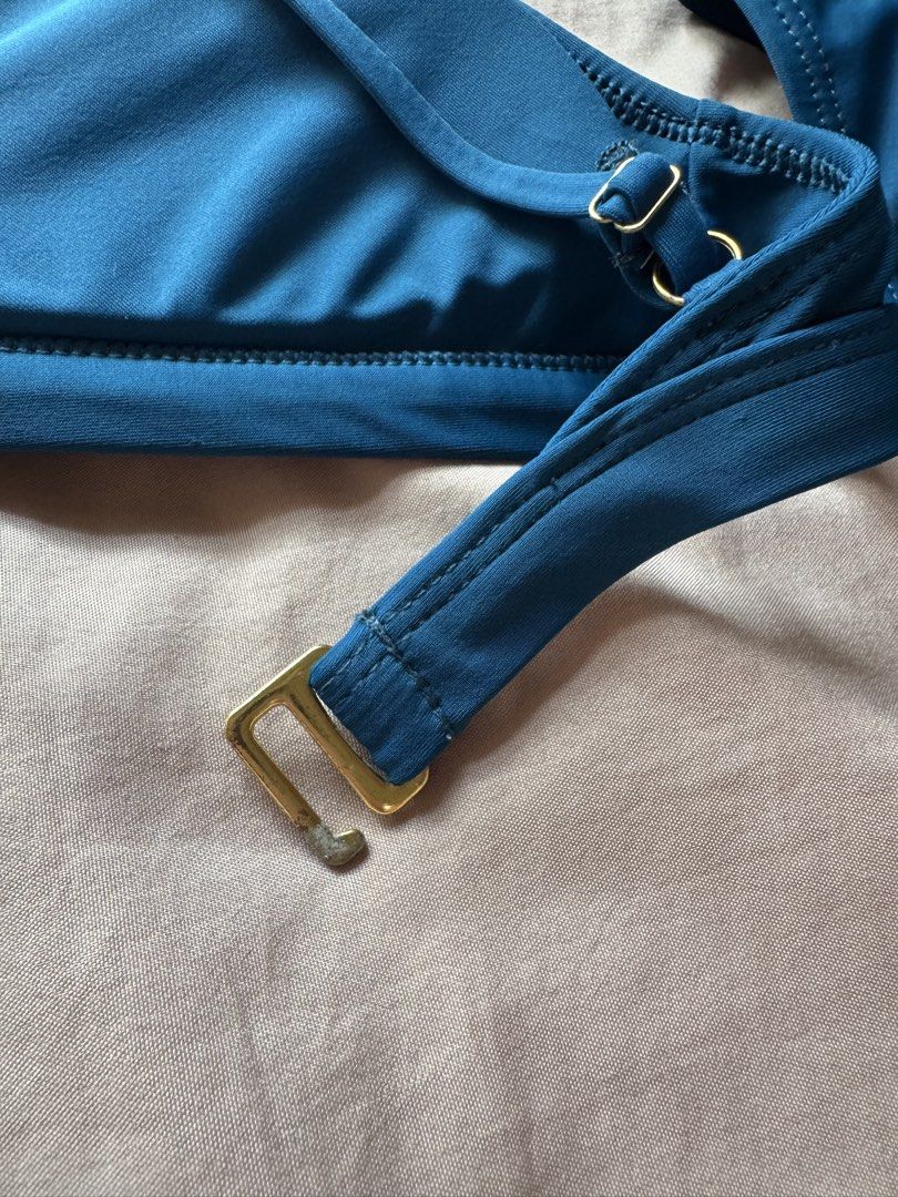 Nudeswim teal halter neck bikini (S) (Category: Bikinis & Swimsuits) located in Dumaguete. Submitted by prelovedbyserene98 (Listing ID 1459899210, Image 3). Description: - Nudeswim Micah top in teal (currently unavailable on Shoppee and website - purchased in 2024) - Size S (refer to size chart) - Tarnished hardware but still in good condition.
