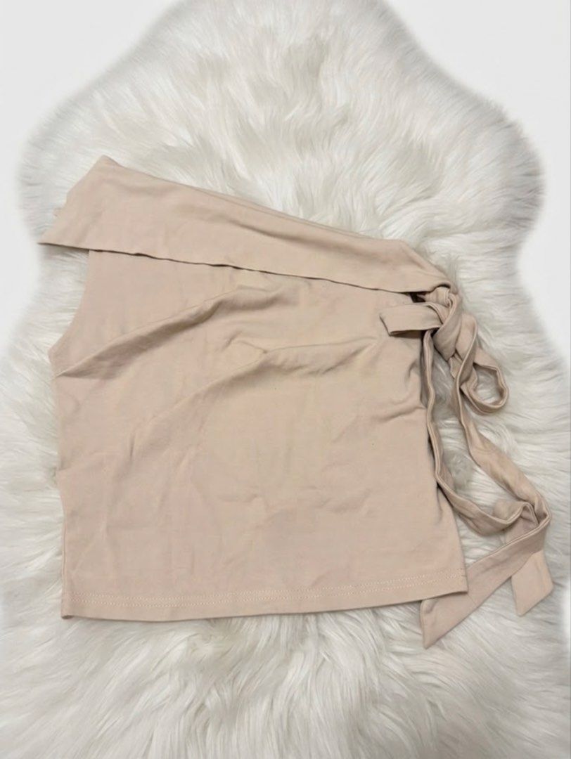 Off Shoulder Bow Detail Top (Category: Blouses) located in Quezon City. Submitted by kimibery (Listing ID 1459751680, Image 3). Description: - Cute off-shoulder design - Pretty bow detail on the side - Soft and comfortable fabric - Perfect for dressing up or down - Pairs well with jeans or skirts - Easy to wear and style - S-M.