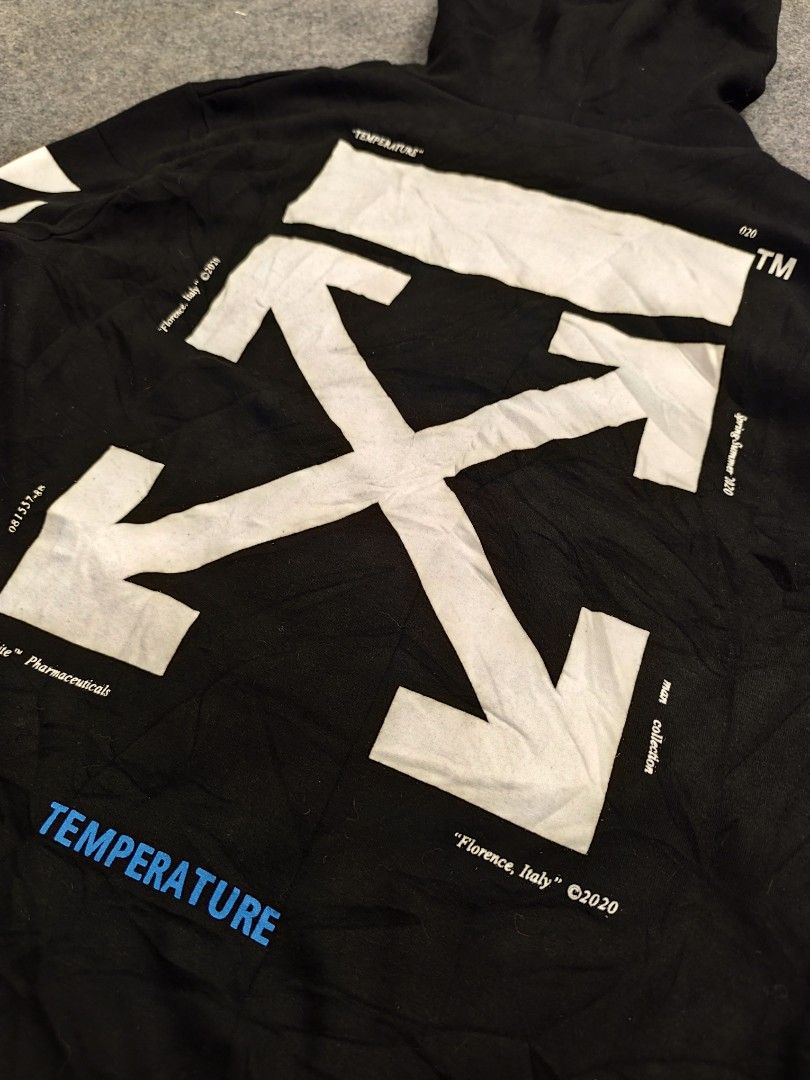 OFF-WHITE Mona Lisa Hoodie Black (Category: Coats, Jackets and Outerwear) located in Cordova. Submitted by bsb.streetluxvintage.clothing (Listing ID 1459795041, Image 3). Description: - Authentic OFF-WHITE Hoodie - Color: Black - Size: 2 - Iconic Mona Lisa graphic on front - Signature OFF-WHITE diagonal stripes on sleeves - 'TEMPERATURE' text detail on front pocket and back - Made in Italy.