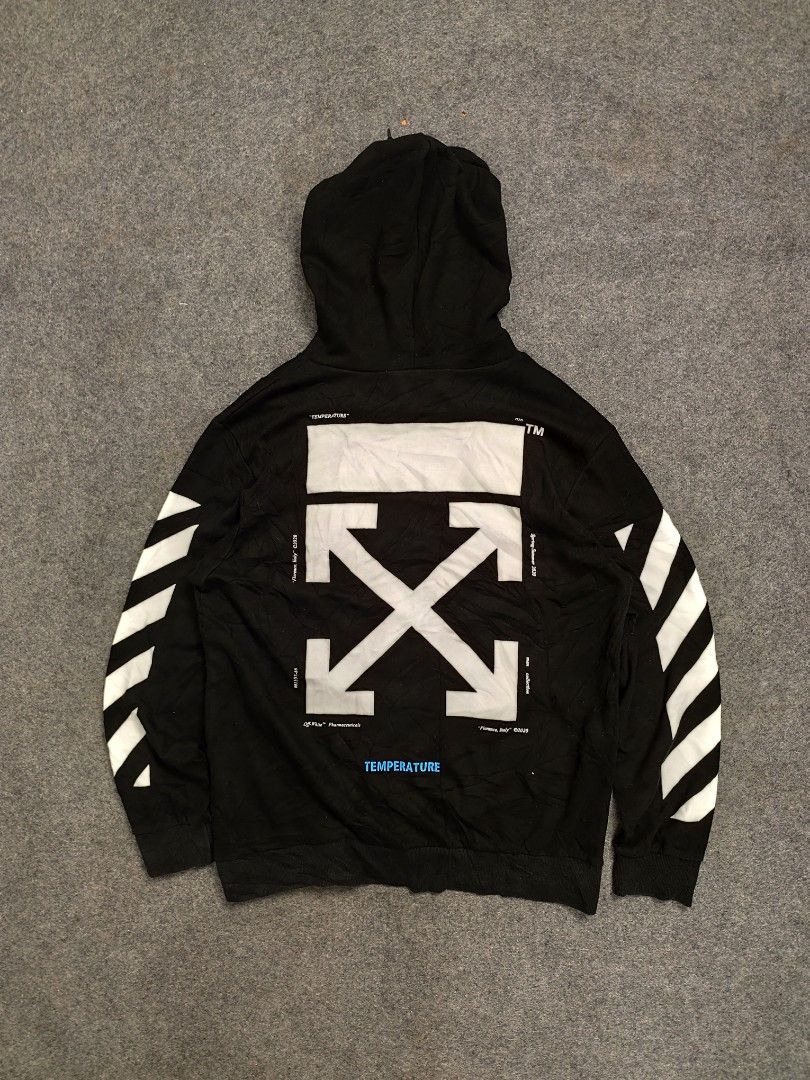 OFF-WHITE Mona Lisa Hoodie Black (Category: Coats, Jackets and Outerwear) located in Cordova. Submitted by bsb.streetluxvintage.clothing (Listing ID 1459795041, Image 2). Description: - Authentic OFF-WHITE Hoodie - Color: Black - Size: 2 - Iconic Mona Lisa graphic on front - Signature OFF-WHITE diagonal stripes on sleeves - 'TEMPERATURE' text detail on front pocket and back - Made in Italy.