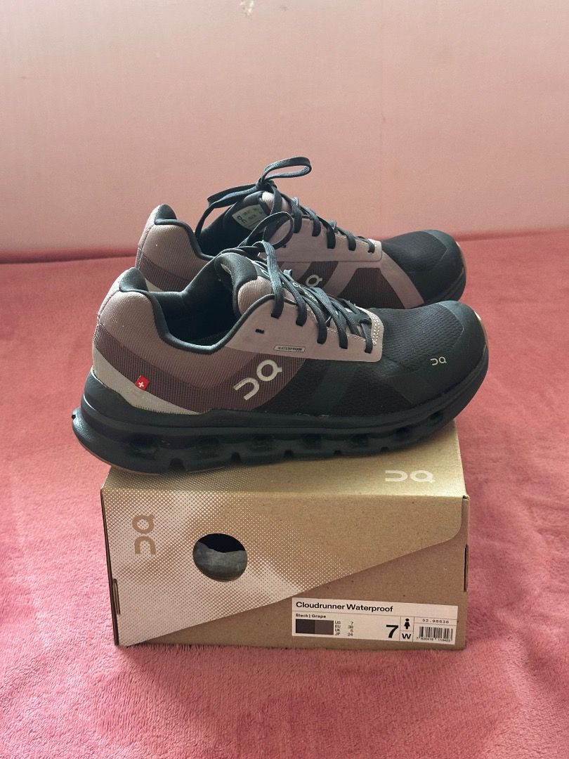 ON Running Cloudrunner Waterproof Shoes US W7 EU 38 (Category: Sneakers) located in Pasig City. Submitted by gandara12345678 (Listing ID 1459708062, Image 3). Description: - Original ON Running Cloudrunner Waterproof Shoes - Size: US W7 / EU 38 / UK 5 / JP 24 - Color: Black with pink and brown accents - Ideal for running and everyday wear - Waterproof - Comes with original box.