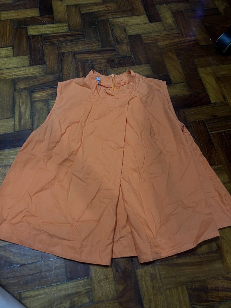 Orange Party Top (Category: Others Tops) located in Quezon City. Submitted by chloe_declutter (Listing ID 1459763949, Image 1). Description: Open to pickup/j&t delivery Cubao QC location Still available 9/26 Code: Teal Box.
