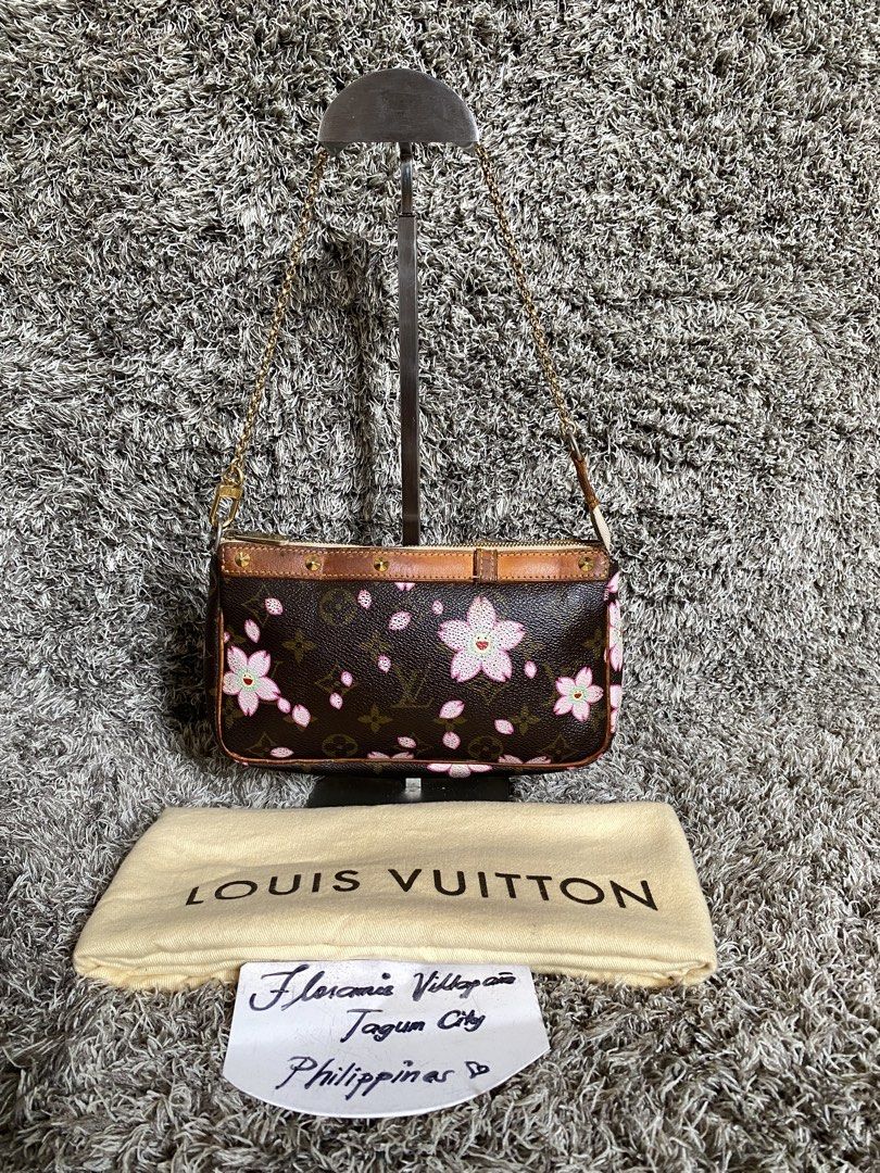Orig pochette (Category: Luxury Accessories) located in Tagum. Submitted by amarasluxbag (Listing ID 1459780997, Image 1). Description: With flaws Replaced na yong chain galing din sa original lv eva Missing ribbon Faded hardwares May kunting dirt da loob Bawal to sa maselan.