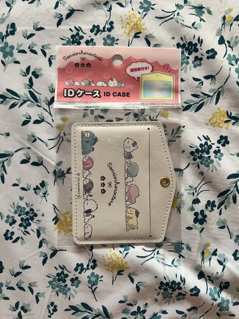 Original Sanrio Characters ID Card Holder Case (Category: Wallets & Card holders) located in Tacloban City. Submitted by jojosfrills (Listing ID 1459741193, Image 1). Description: Original Sanrio Characters ID Card Holder Case - White colored with various Sanrio character prints - Clear window for your ID - Secure snap closure - Ideal for school or work - Keeps your ID safe and stylish.