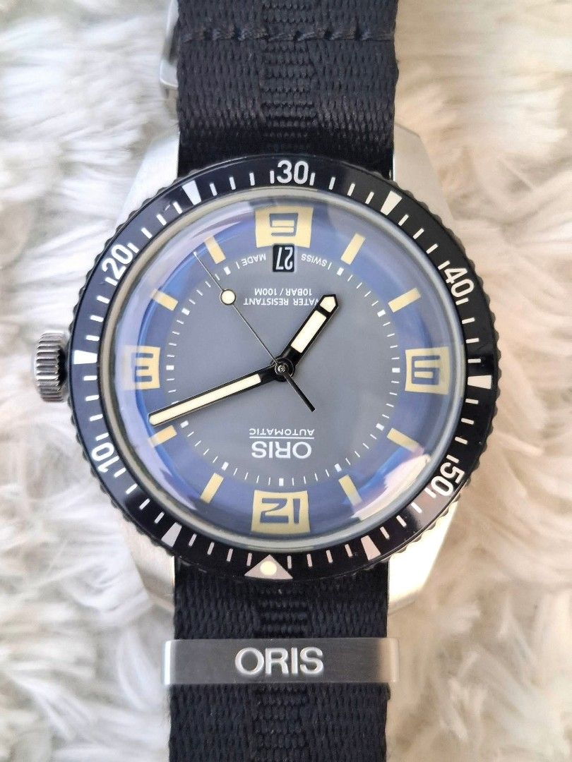 Oris Automatic Diver 65 (Category: Luxury Watches) located in Antipolo. Submitted by 48watches (Listing ID 1459693213, Image 1). Description: CLAIM THIS PIECE❗️❗️❗️ Oris diver sixty five ( Rare dial color ) Ref : 01 733 770 74065 Dize : 40mm Dial : Deauville blue - grey Movement : Oris 733 Year : Approx 2010 - 2015 Condition : 9 / 10 Inclusion : watch GRAB this for only : 49,000 php.