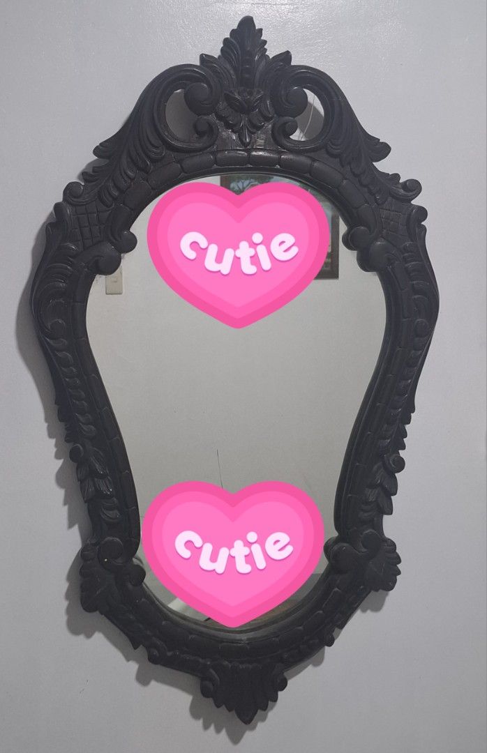 Ornate Black Wall Mirror with Vintage Frame (Category: Mirrors) located in Rizal. Submitted by antikera2023 (Listing ID 1459832983, Image 1). Description: - Stunning dark, ornate mirror with intricate detailing. - Features carved swirls and floral motifs for a vintage feel. - A true statement piece for any room. - Ready to hang..