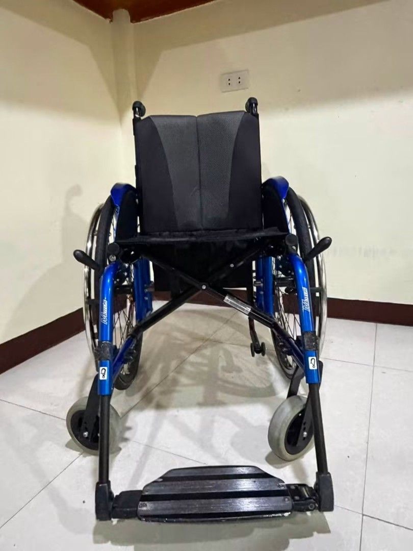 Ottobock Folding Lightweight Wheelchair (Category: Medical Supplies & Tools) located in Manila. Submitted by bernajimenez (Listing ID 1459895328, Image 2). Description: FOR SALE 🦽 Ottobock Folding Lightweight Wheelchair ✅ Brand: Ottobock (Premium German Quality) ✅ Frame: Sturdy blue alloy, fully foldable & compact ✅ Seat: Black breathable padded backrest with Ottobock branding ✅ Wheels: Quick-release large rear wheels, easy transport/storage ✅ F