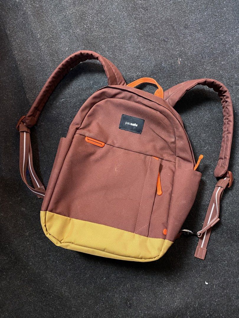 PACSAFE Go 15L Anti- Theft Backpack (Category: Backpacks) located in Quezon City. Submitted by loloyz123 (Listing ID 1459833509, Image 1). Description: PACSAFE Go 15L Anti- Theft Backpack Condition: Very good Color rate: 10/10 Color: Maroon/ Brown .