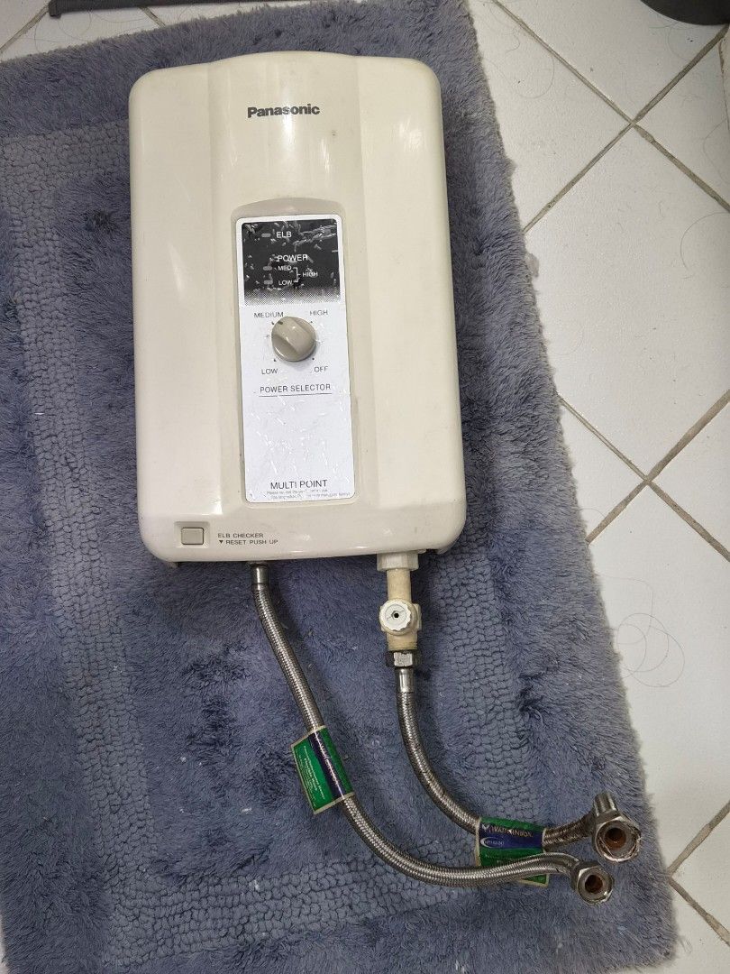 Panasonic Multi Point Water Heater (Category: Water Heater & Instant Showers) located in Makati City. Submitted by edconstant (Listing ID 1459711211, Image 2). Description: - Panasonic Multi-Point Water Heater - Color: white - Power Selector: OFF, LOW, MEDIUM, HIGH settings - Built-in ELB checker for safety - For REPAIR : Diaphragm O-ring (included), switch .