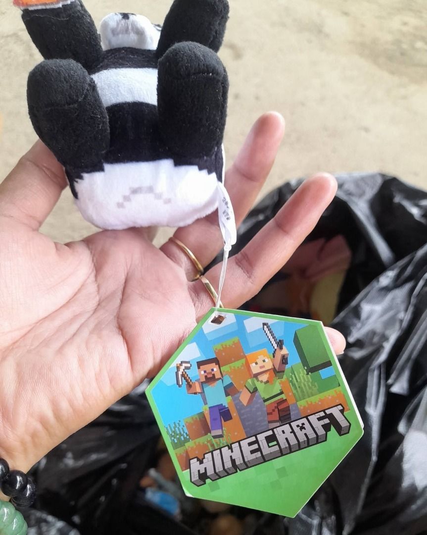 Panda – Minecraft Plush (Category: Plushies & Soft Toys) located in Paombong. Submitted by revox.store (Listing ID 1459845487, Image 2). Description: Minecraft • Plush Included: ✓ Minecraft panda plush with cake accessory, hanging strap, and tags Original paper tag attached Flaws: • Light surface lint on plush fabric 🏬 Stored at partner warehouse (Nueva Ecija) — sender name may differ 🔄 Crossposted — first confirmed buyer gets priority 💳 GCash