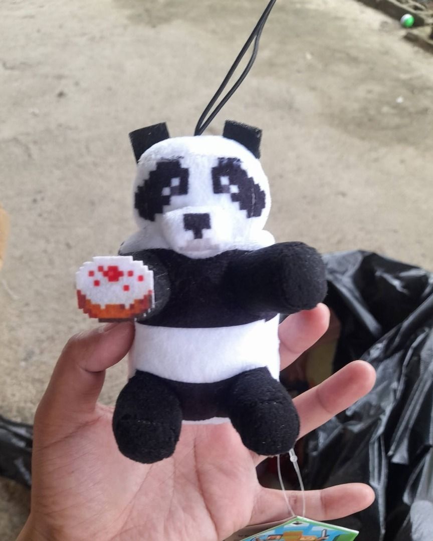 Panda – Minecraft Plush (Category: Plushies & Soft Toys) located in Paombong. Submitted by revox.store (Listing ID 1459845487, Image 1). Description: Minecraft • Plush Included: ✓ Minecraft panda plush with cake accessory, hanging strap, and tags Original paper tag attached Flaws: • Light surface lint on plush fabric 🏬 Stored at partner warehouse (Nueva Ecija) — sender name may differ 🔄 Crossposted — first confirmed buyer gets priority 💳 GCash