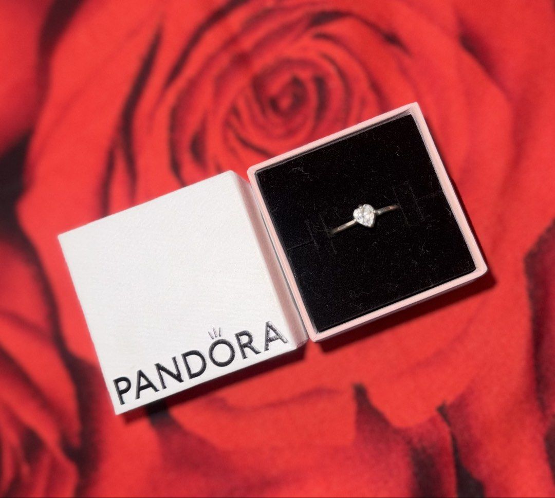 Pandora Silver Heart Ring with Box (Category: Rings) located in Manila. Submitted by typsiris_29 (Listing ID 1459732496, Image 1). Description: 💍 PANDORA SPARKLING HEART SOLITAIRE RING — BRAND NEW Selling my Pandora Sparkling Heart Solitaire Ring🤍✨ • Authentic Pandora • Sparkling Heart Solitaire design • Brand new — never worn • Wrong size, unfortunately • Comes with original Pandora box • Perfect as a gift or for personal use 🎁 📩 PM me if in