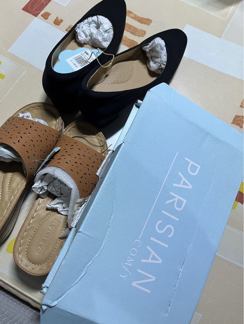 PARISIAN COMFY Brown Perforated Slides Sandals (Category: Flats & Sandals) located in Manila. Submitted by graceeeeee_ (Listing ID 1459742902, Image 3). Description: - Brand: PARISIAN COMFY - Color: Brown - Style: Open-toe slides - Design: Perforated strap across the foot - Sole: Comfortable wedge sole - Occasion: Perfect for casual wear - Condition: Comes with original packaging.