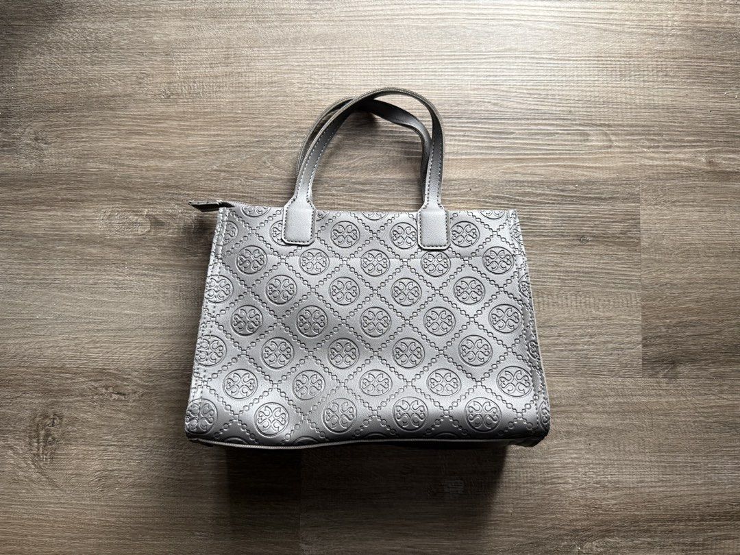 PARISIAN Grey Embossed Tote Bag with Shoulder Strap (Category: Tote Bags) located in San Juan City. Submitted by tpwk_harry (Listing ID 1459745132, Image 2). Description: - Selling for a friend - In very good condition - Once used and then after naka stock nalang since hindi ginagamit - Good quality bag ! - Stylish grey tote bag with an embossed pattern - Comfortable top handles - Secure zip closure - Includes a detachable shoulder strap for vers