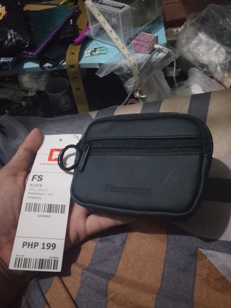Penshoppe Black Mini Pouch / Wallet — BNWT with Keyring (Category: Wallets & Card Holders) located in San Juan, La Union. Submitted by declutteringog7 (Listing ID 1459690748, Image 2). Description: Got it — same clean carousel format as before! Here you go: Title: Penshoppe Black Mini Pouch / Wallet — BNWT with Keyring Price: ₱100 lp Description: ✨ Brand New with Original Tag 🏷️ Original Price: ₱199 🖤 Smooth black material — sleek & durable 🔑 