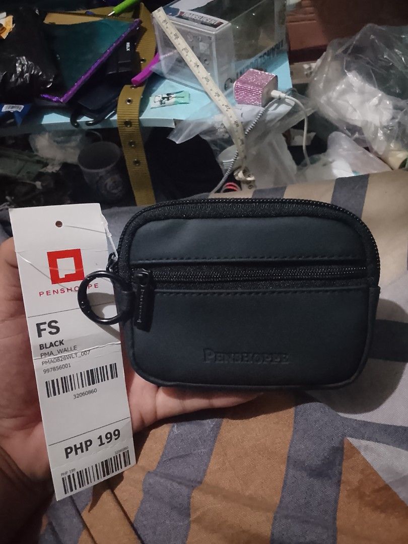 Penshoppe Black Mini Pouch / Wallet — BNWT with Keyring (Category: Wallets & Card Holders) located in San Juan, La Union. Submitted by declutteringog7 (Listing ID 1459690748, Image 1). Description: Got it — same clean carousel format as before! Here you go: Title: Penshoppe Black Mini Pouch / Wallet — BNWT with Keyring Price: ₱100 lp Description: ✨ Brand New with Original Tag 🏷️ Original Price: ₱199 🖤 Smooth black material — sleek & durable 🔑 