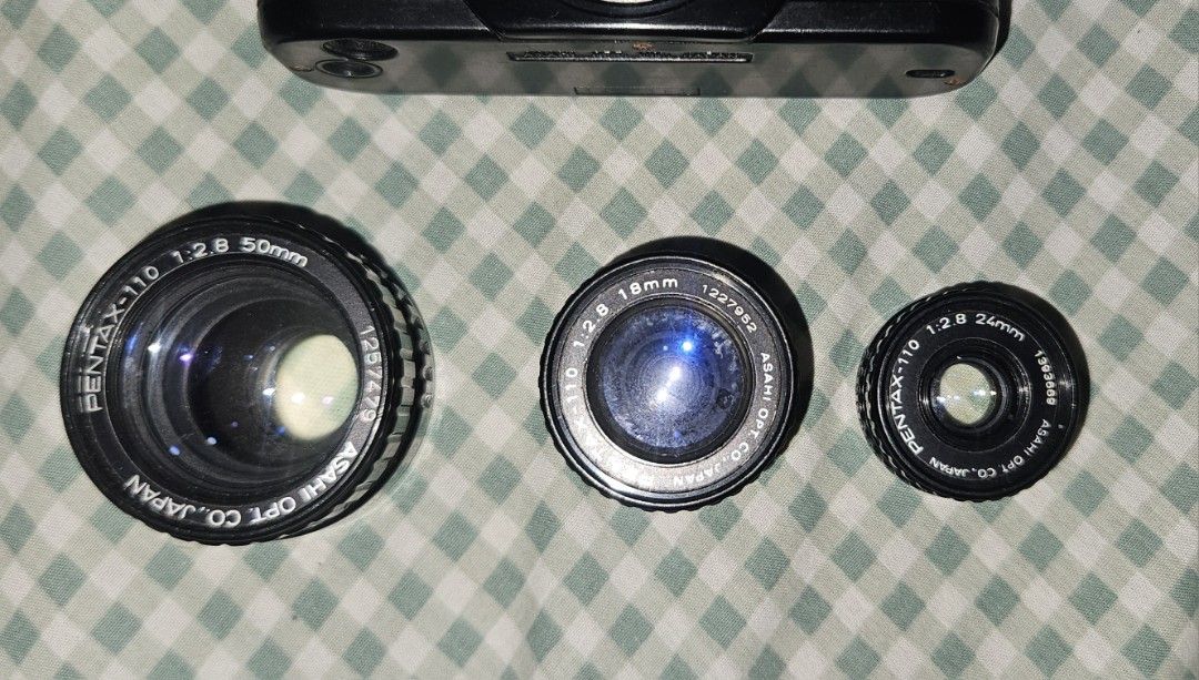 Pentax Auto 110 Camera with Lenses and Flash (Category: Cameras) located in Bacolod City. Submitted by sammrenee25 (Listing ID 1444712502, Image 3). Description: - Pentax Auto 110 camera body - Two lenses included with lens cap - Pentax flash unit included This was my mom's from way back then. With 2 new batteries installed but no film. I am not a camera enthusiast so I don't really know how to test or work it..